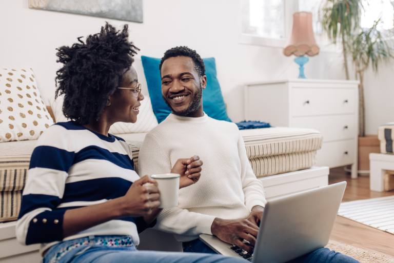 couple looking at a laptop